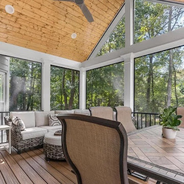 Screened porch with cathedral wood ceiling